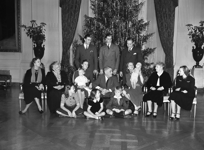 Illustration for article titled 70 Years of First Ladies Standing in Front of Christmas TreesÂ
